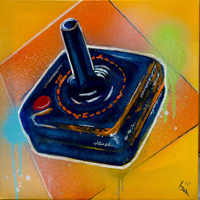 Atari 2600 Joystick on colorful background.